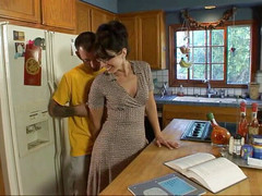 Real Life Cougars: Cougar stepmom with big ass gets banged in the kitchen