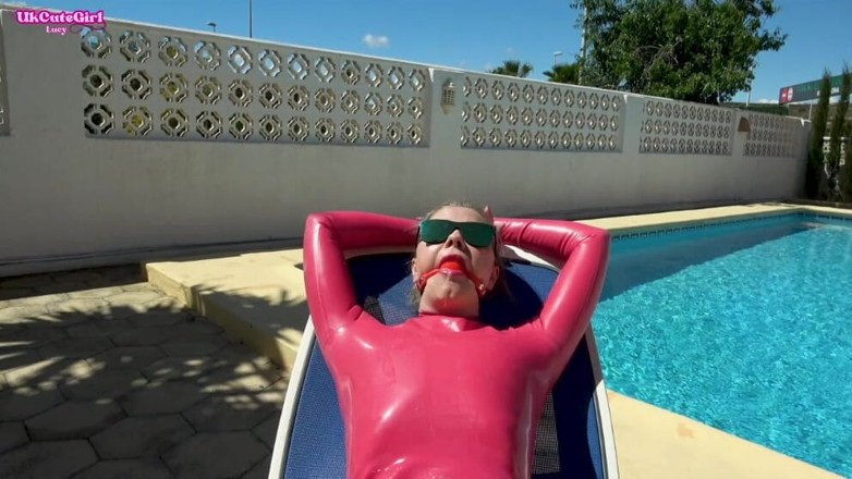 UKCuteGirl Lucy Lauren: Sunbathing Gagged in Latex - Shiny Messy Drool Whore