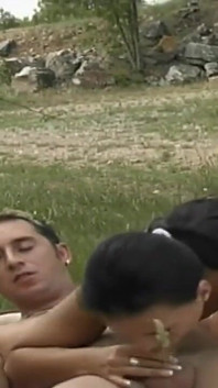 Two young sluts get fucked outdoors by a man with a big hard cock