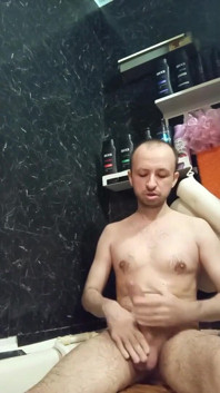 A Naked Man Jerks off His Big Dick in the Bathroom.