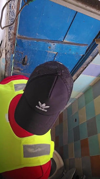 Two Construction Workers Making Out in the Company Bathroom.