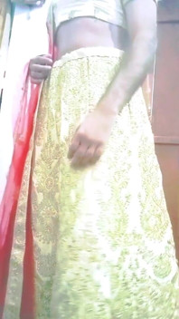 Indian Gay Crossdresser Gaurisissy Feeling Horny in Golden Lehanga