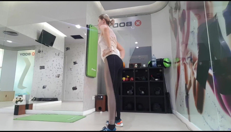 Erotic Tanya: Blonde teen warming up before workout