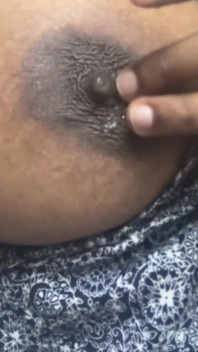 Playing with Her Nipple