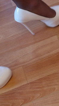 Walking in My High White Shiny Stilettos