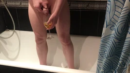 Sissy plays with her own piss