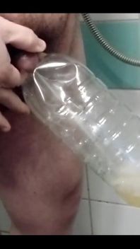 Superchub Pissing in Bottle