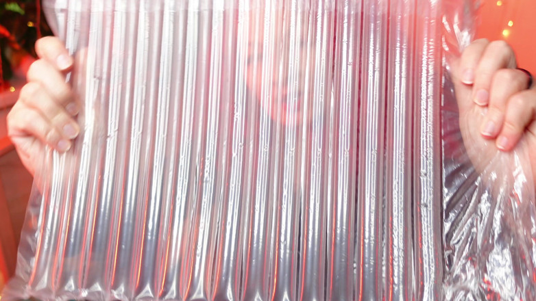 Arya Grander: ASMR plastic, hot-sounding video