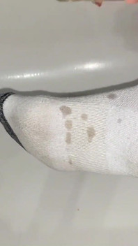 Fußölmassage in knöchelsocken