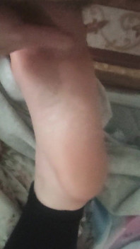 Playing with Friends Soles, While She's Reading.