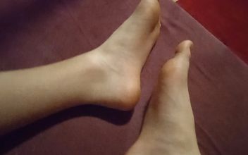 Beautiful White Legs From Which I Take off My Socks