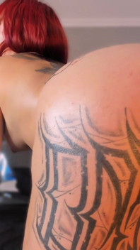 Latina Shakes Her Tattooed Butt