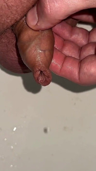Playing with Foreskin While Peeing