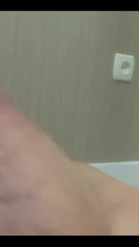 Masturbating