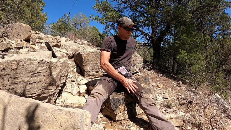 Lapetus: Wetting jeans while rock collecting outdoor