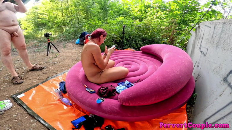 Pervert Couple: Outdoor rough fucking on an air mattress close to a...