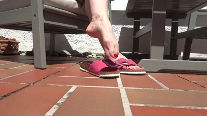 Lady Victoria Valente: Shoe play, toe wiggling, wrinkled soles on the garden terrace