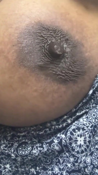 Playing with Her Nipple