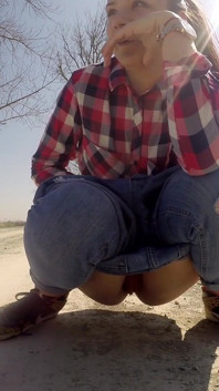 Desperate Babe with Full Bladder Empty Her Bladder and Pee on a Dirt Road