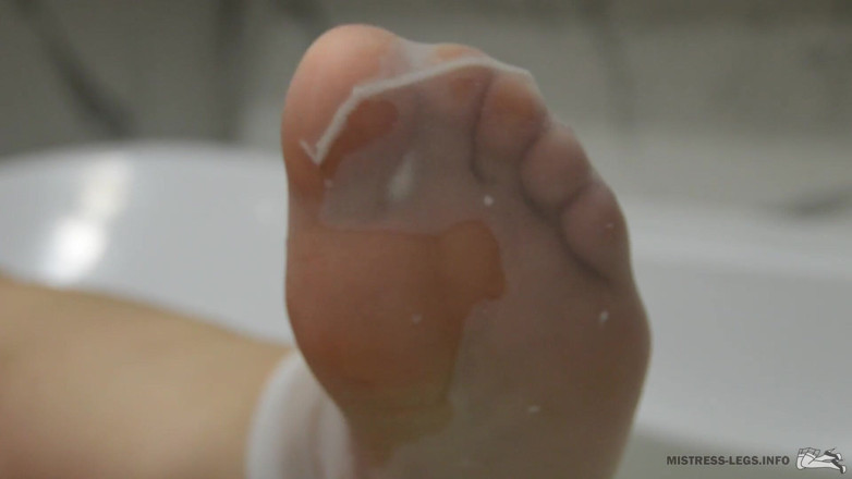 Mistress Legs: Mistress legs in wet white nylon socks