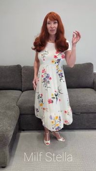 A Redhead in a Dress