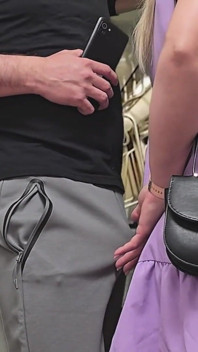 Almost Seen by Subway Passengers When She Touch Stranger's Dick Through Pants