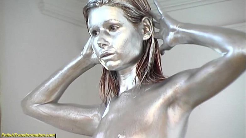 Fetish Islands: Silver metallic painted bald head statue mannequins posing