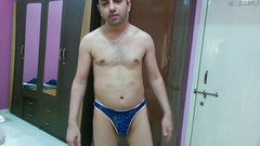 Cute & Nude Crossdresser: Hot nude boy trying out his new sexy thong.