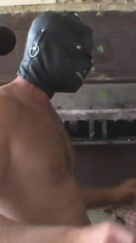 Humiliating threesome with masked muscle cock