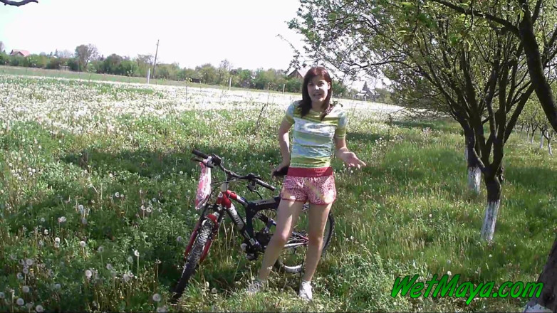 Wet Maya: Peeing on her bicycle