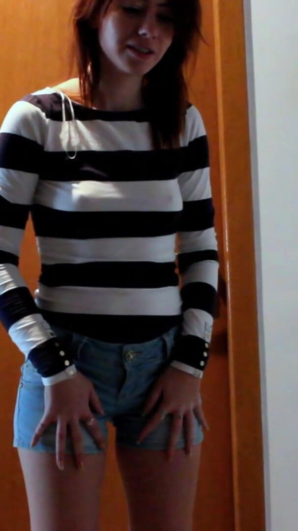 Skinny Redhead Pee in Her Short Jeans