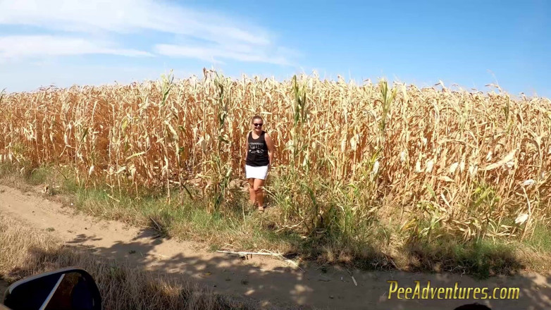 Pee Adventures: Pee in a corn field and wet her skirt