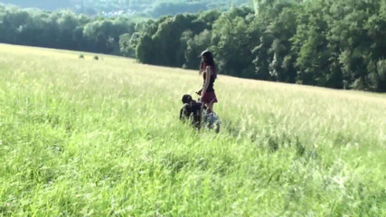 Femdom Austria: Pet on the leash in a meadow