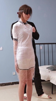 A Cute Barefoot Girlfriend Uses Tape to Bind Her Whole Body, Playing with Her Cute Bare Feet
