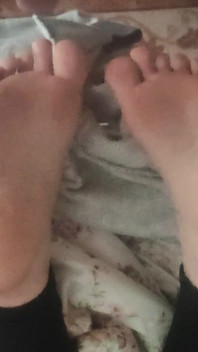 Playing with Friends Soles, While She's Reading.