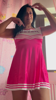Majorette MILF Teased with Fingers While Bent Over in Tight Dress