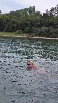 Sexy Granny Swims Naked in a Lake!