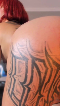 Latina Shakes Her Tattooed Butt