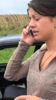 An elderly gentleman sees a young girl in trouble with her car
