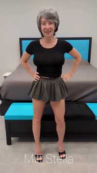 Sadie in a Grey Mini Skirt with a Black Top & Heels