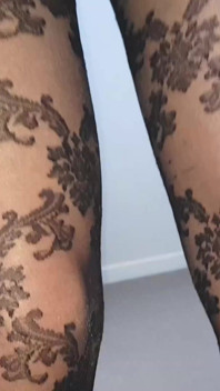 Dani Showing Sexy Legs in Patterned Pantyhose
