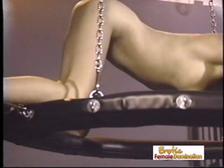 Erotic Lezdom: Brunette domina whips her slave