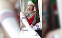 Katty Grray: A fantástica ajudante do Papai Noel se acaricia com pirulito...