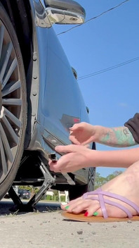 67 Tall Amazon Goddess Changes Her Tire - Big Feet in Frame