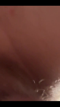 Masturbating