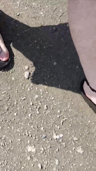 Outdoor in a Black Caftan and Barefoot in Black Birkenstocks